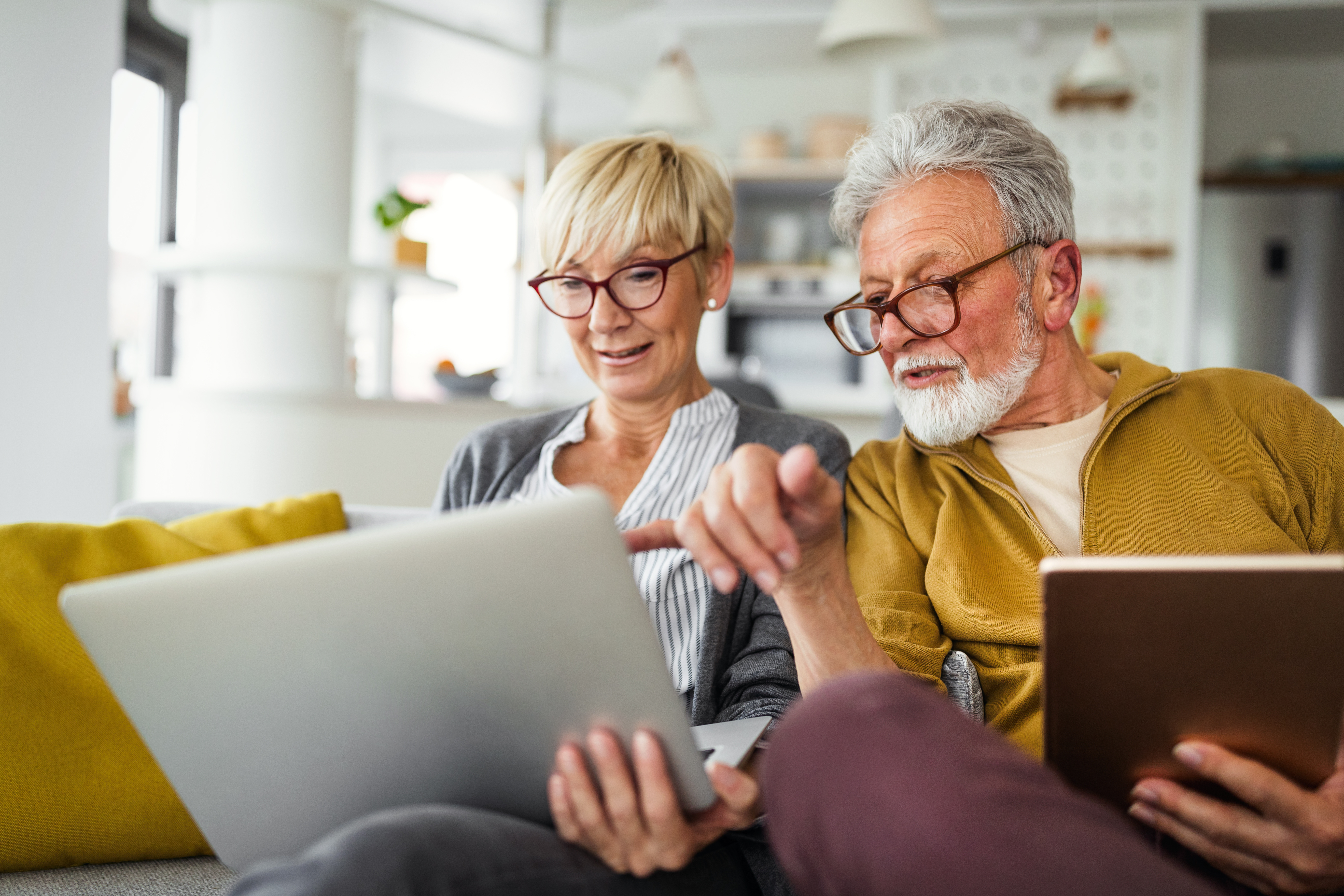 Couple reviewing home design options together
